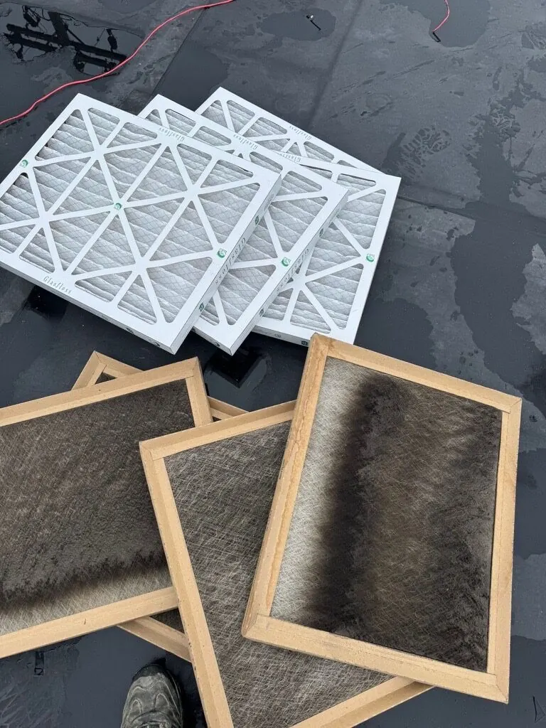 New replacement filters alongside used filters