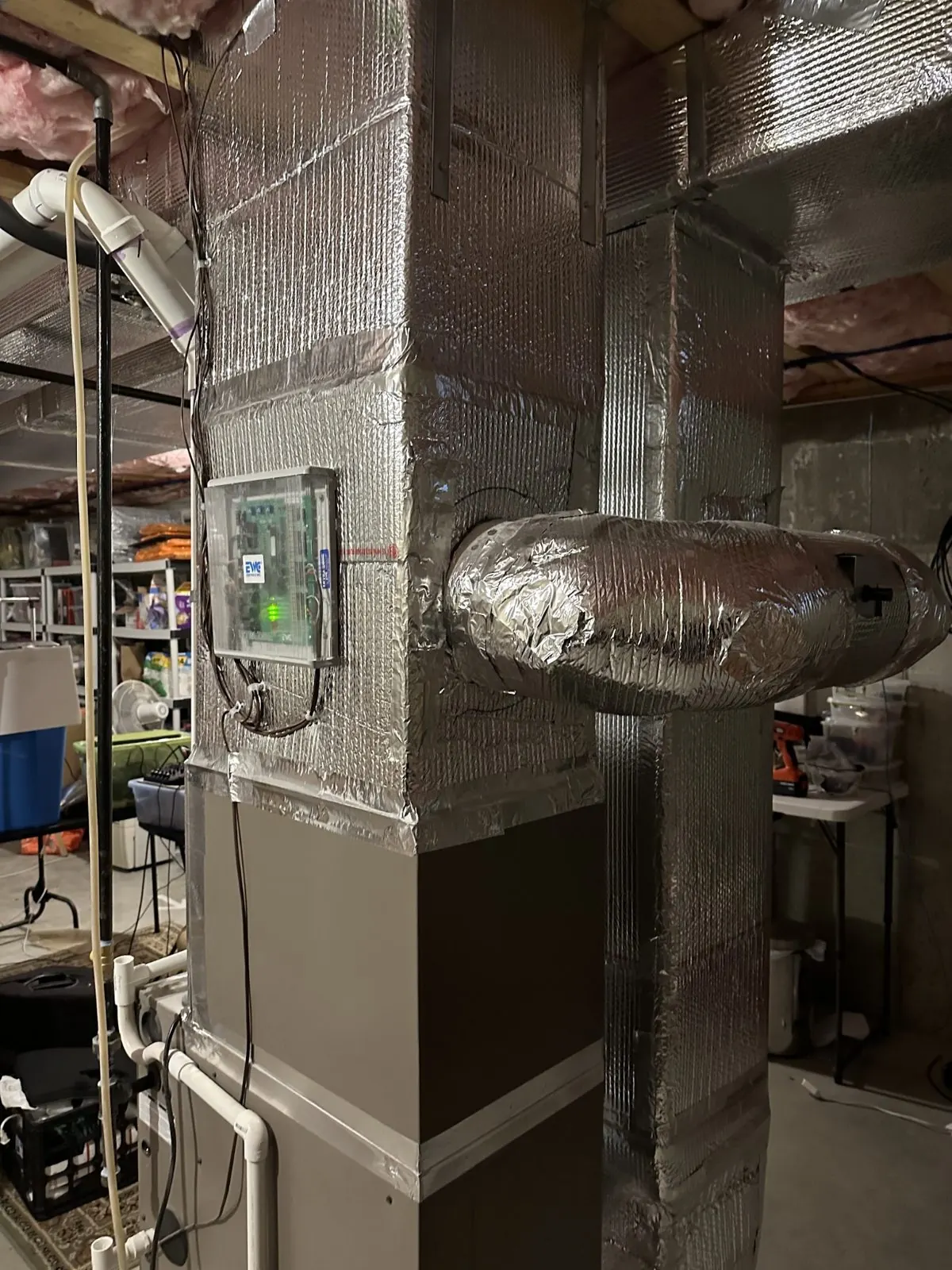 Furnace with insulated plenum and controls