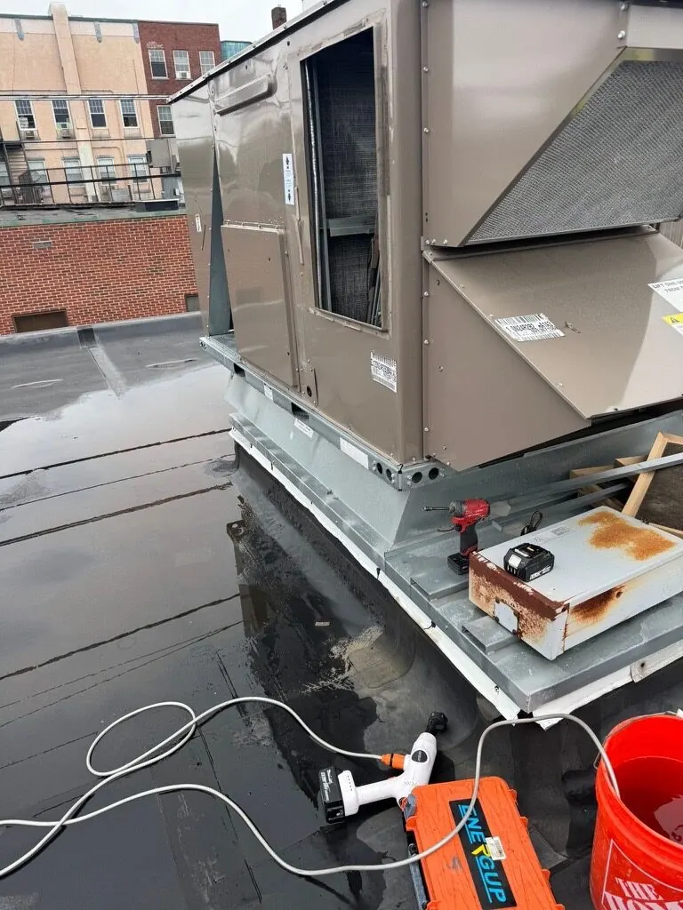 Commercial rooftop HVAC unit during maintenance