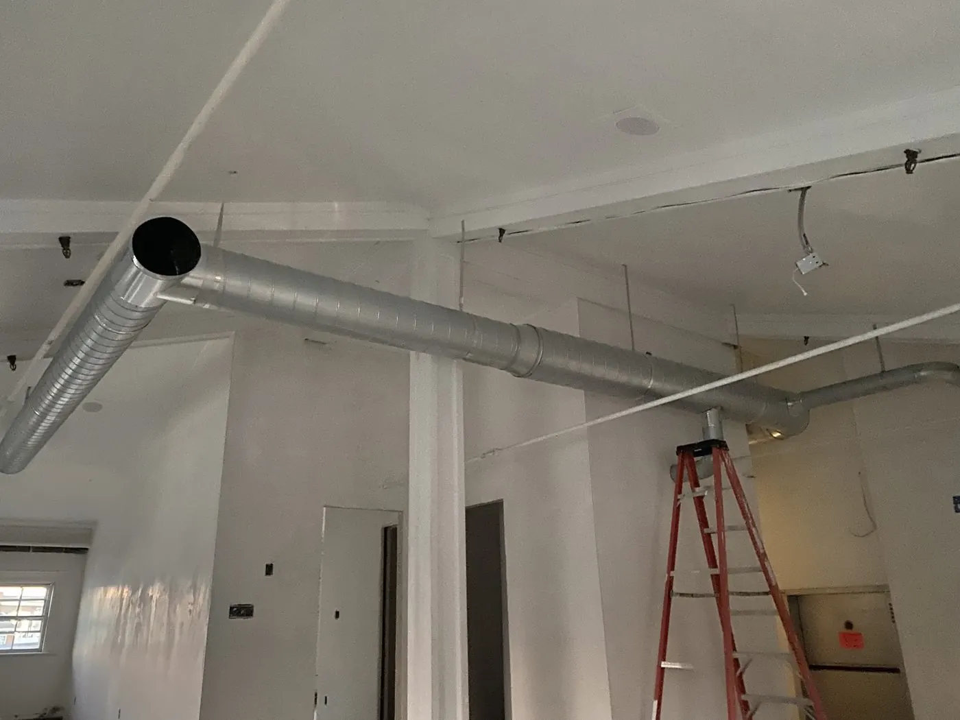Exposed round duct installation