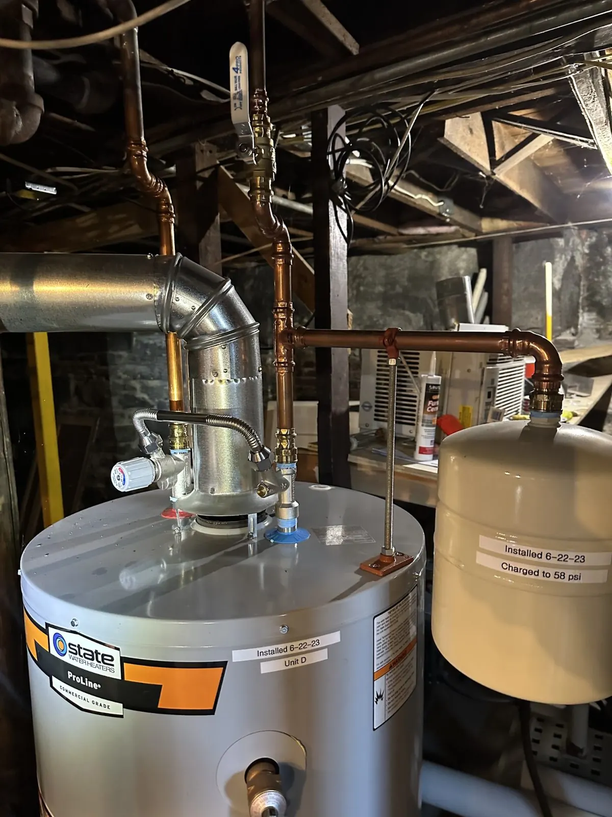 Replacement water heater with updated piping and expansion tank